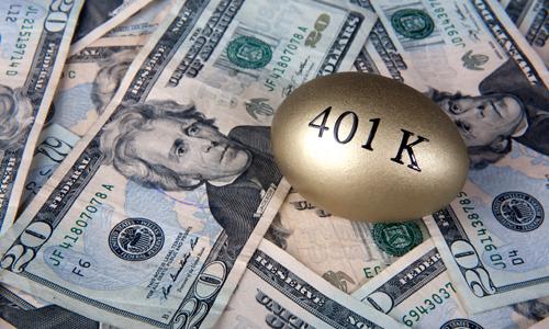 401k golden nest egg on top of $20 bills.