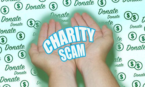 Outstretched hands with "Charity Scam" inside.