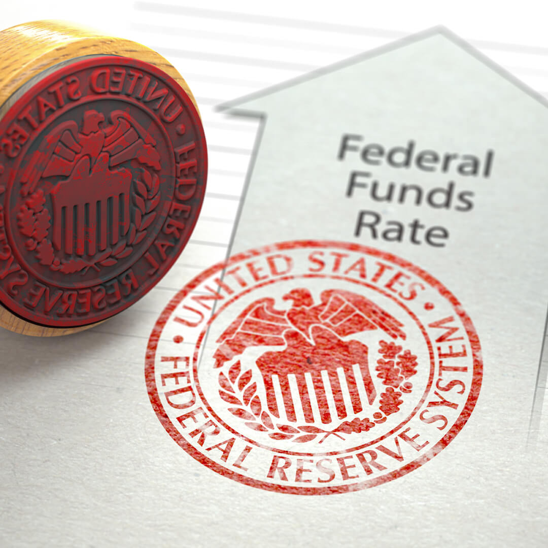 Stamp of United States Federal Reserve System, signifying change to Federal Funds Rate