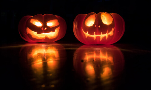 Jack o Lanterns illustrating Halloween Scams