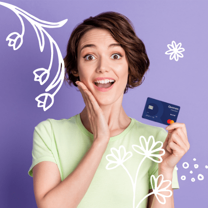 Young woman holds a Quorum Debit Card for her Quorum QChecking.