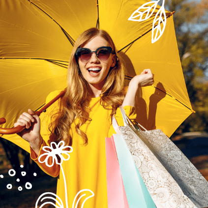 A woman stands under a bright yellow umbrella with all her assets covered by Quorum Umbrella Insurance.