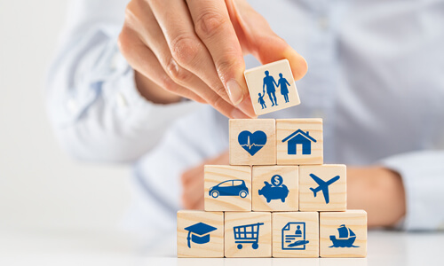 Various icon building blocks representing the different types of insurance