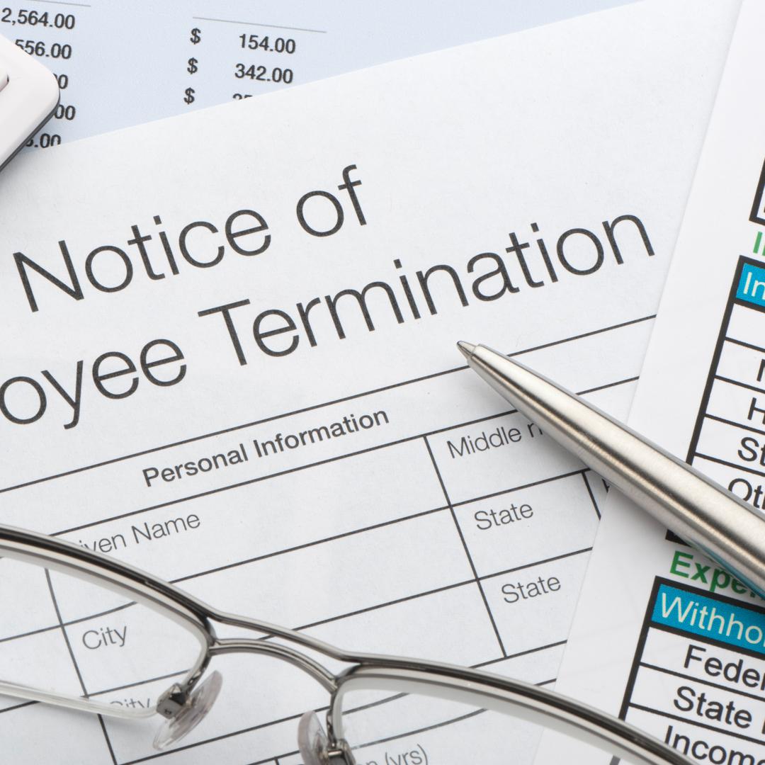 Notice of Employee Termination document on table