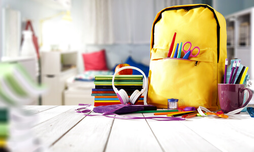 School supplies like backpack, notebooks, pens and pencils, etc.