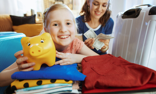 Daughter packing for a trip, mother in background with money in hand, illustrating savings.