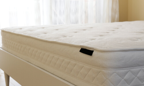 Mattresses (pictured) and bedding are considered a "buy" in May.