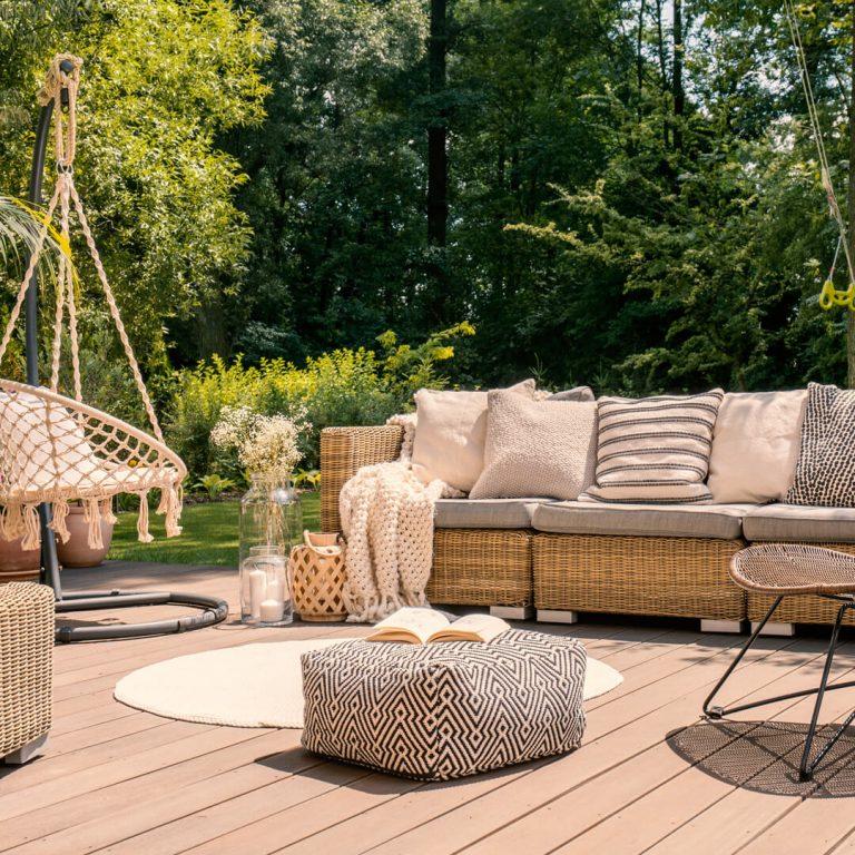 Beautiful outdoor furniture on backyard patio.