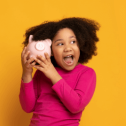 Child Rattling A Piggy Bank