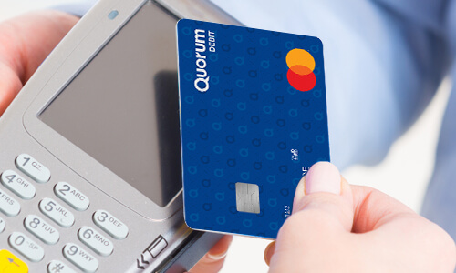 A Quorum Debit Mastercard being used for a purchase transaction.