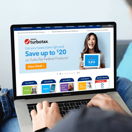 Image of a laptop showing the Member Discount Hompage with a Turbo Tax ad.