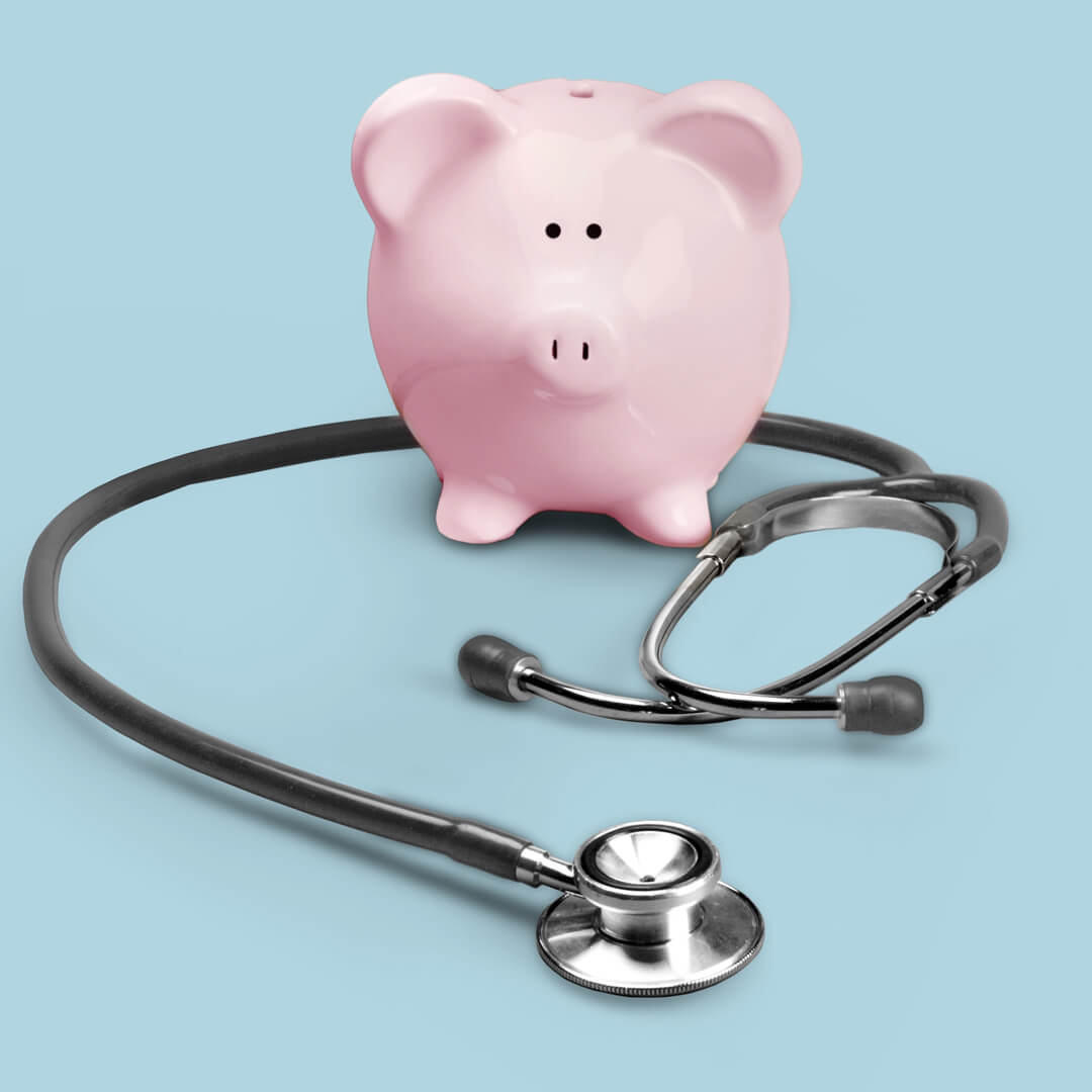 Piggy bank with doctor's stethoscope around it, illustrating a financial checkup.